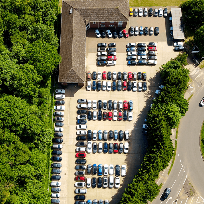 Car lot with many vehicles